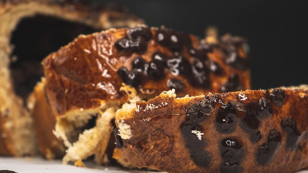 cut slices of brioche with chocolate filling and chocolate chips on top